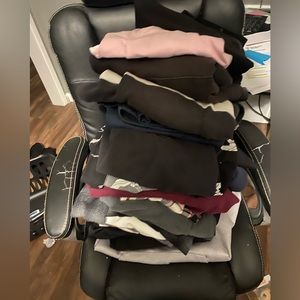 Bunch of random hoodies shirts and pants all men’s L and XL